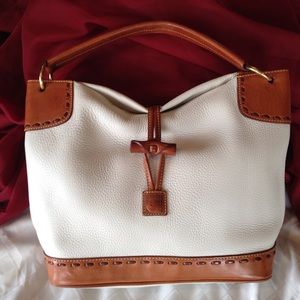 Dooney and Burke Cream and Tan Leather handbag! ❤️
