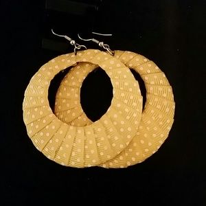 Yellow polka dot hoops.