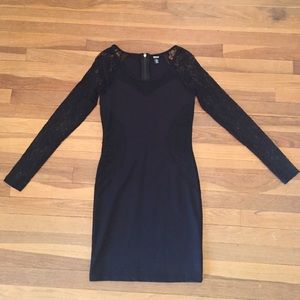 Lace accented black dress