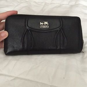 COACH Black leather wallet with zipper closure