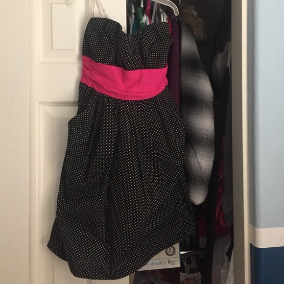 Strapless polka dot dress with pink ribbon