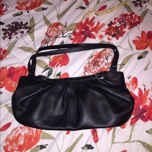 Black leather satchel with silver buckles