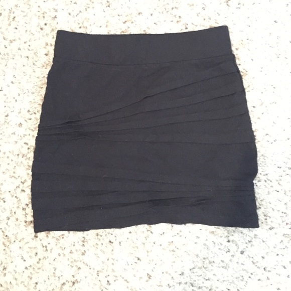 Black pencil skirt. From Love Culture. Size small.