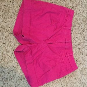 Pink shorts.