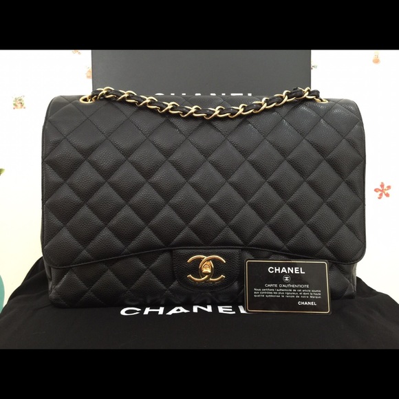 Chanel caviar maxi double flap in black GHW