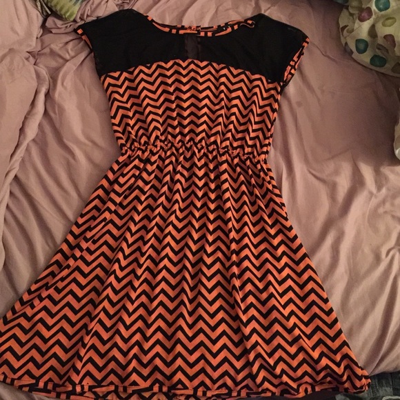 Orange and black zigzag dress from Deb