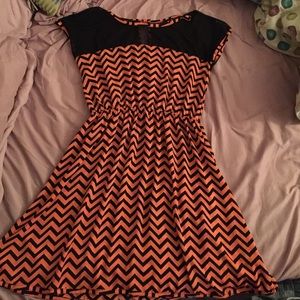 Orange and black zigzag dress from Deb