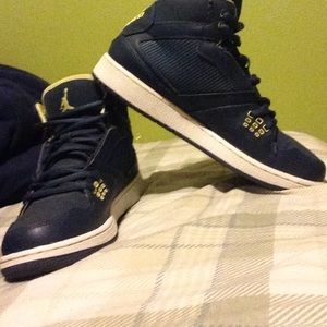 navy blue and yellow Jordan's