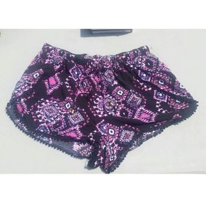 Purple and black tribal print shorts