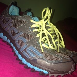 Running Adidas shoes.