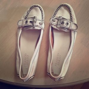 White Franco Sarto flats.