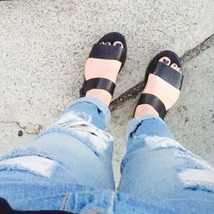 Black sandals.