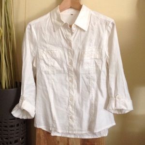 Off white button shirt.