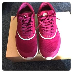 Slightly worn Nike sneakers