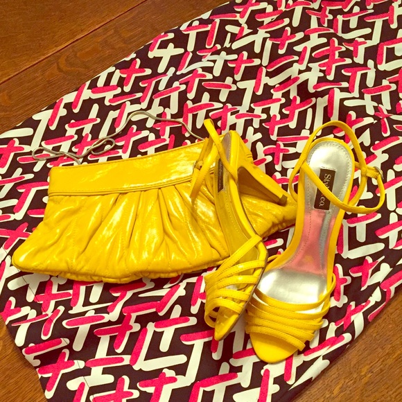 Yellow clutch and heels