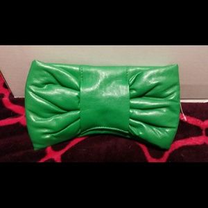 Brand new green bow clutch