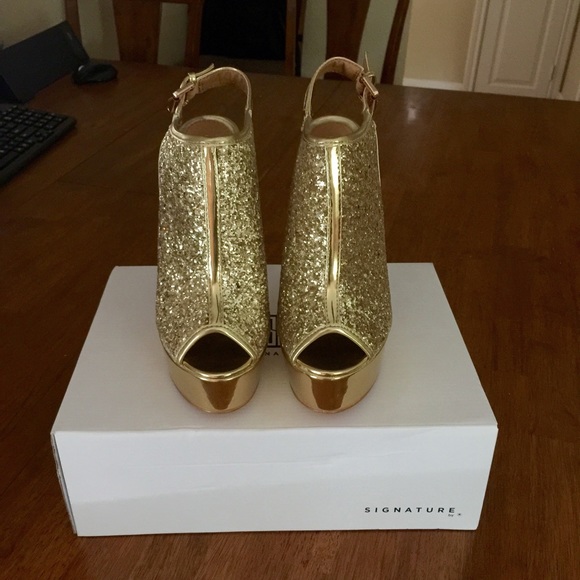 Gold sparkly platform heels
