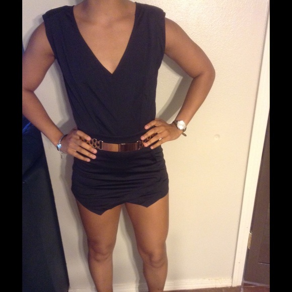 NEW, night life romper with open back!