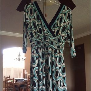 Dark chocolate, khaki, ivory and dark aquamarine.