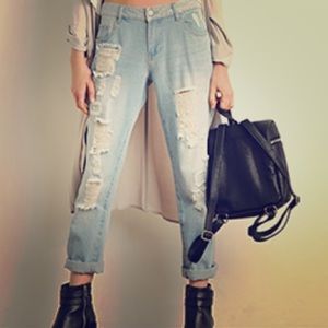 Distressed boyfriend jeans.
