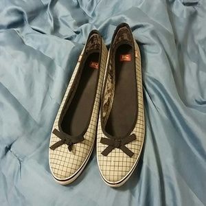 Grey flats, with black stripes