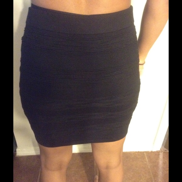 Black fitting mini skirt