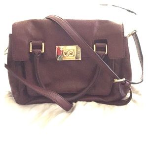 Authentic Michaels Kors burgundy satchel.