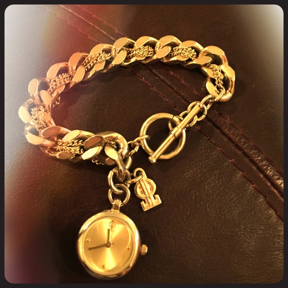 Jennifer Lopez gold charm watch