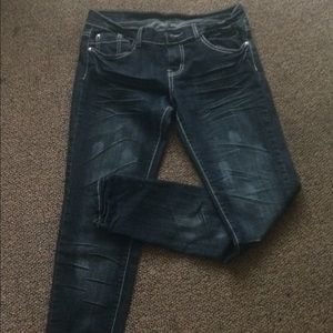 Dark distressed skinnys