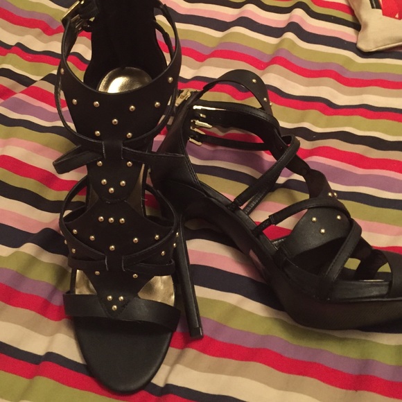 Black and gold zip back stilettos