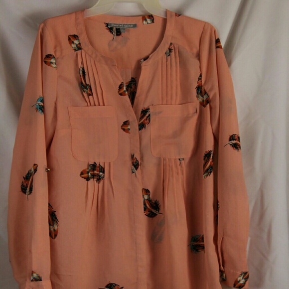 Pink blouse with feather design