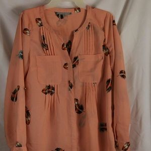 Pink blouse with feather design