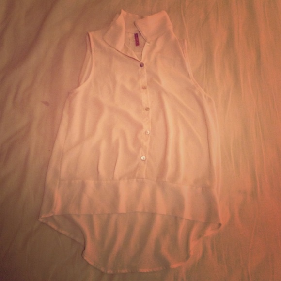 White sleeveless top.