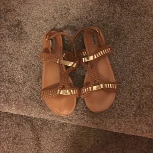 Brown with gold. Not rated brand from buckle