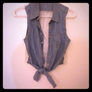 Denim vest with floral detailing on back