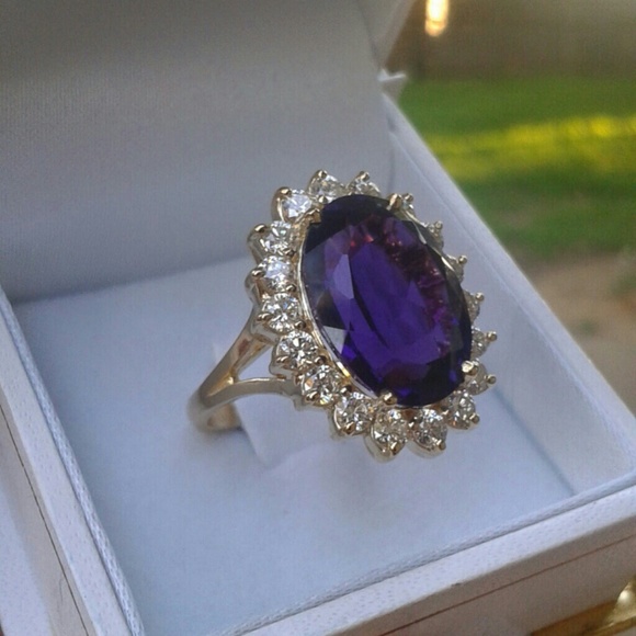 Amethyst and diamond 14k yellow gold ring.