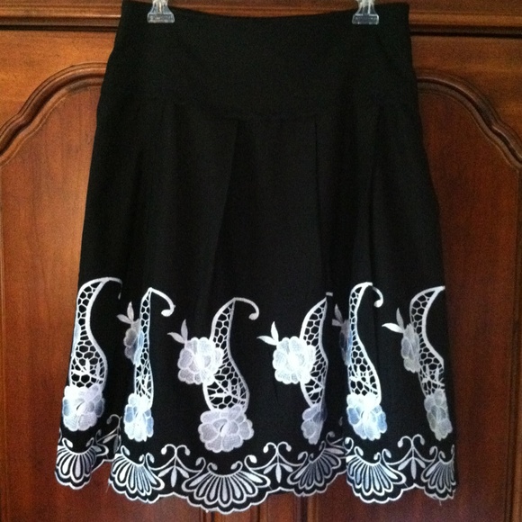 Black skirt with white embroidered flowers