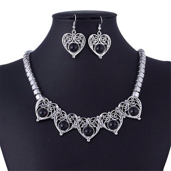 Silver and black heart shaped earrings, necklace. - Picture 1 of 1