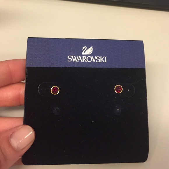Swarovski Ruby stud earings. NEVER WORN.