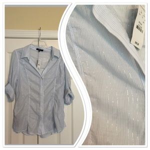 Button up top with silver metallic accents.