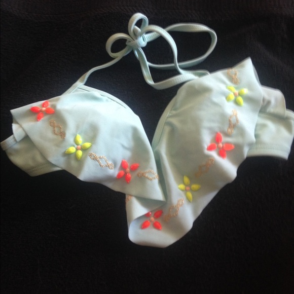 Push up bathing suit top. Make offer.