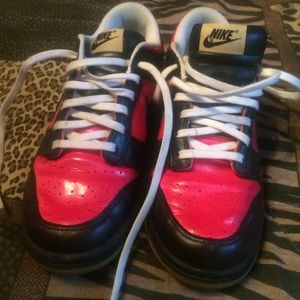 Black and hot pink Nikes