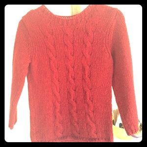 Red wool sweater.