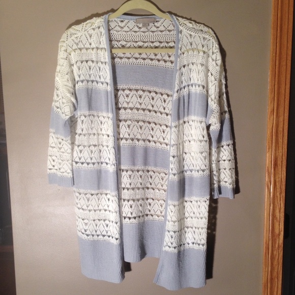 Light blue and white knitted sweater