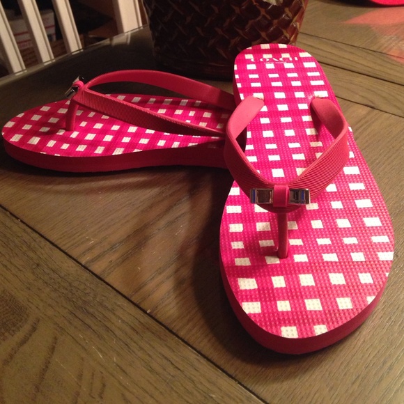 Coach Shoes - NEW COACH Amel rubber flip flops with silver bow