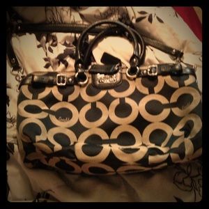 Coach satchel purse with purple inside