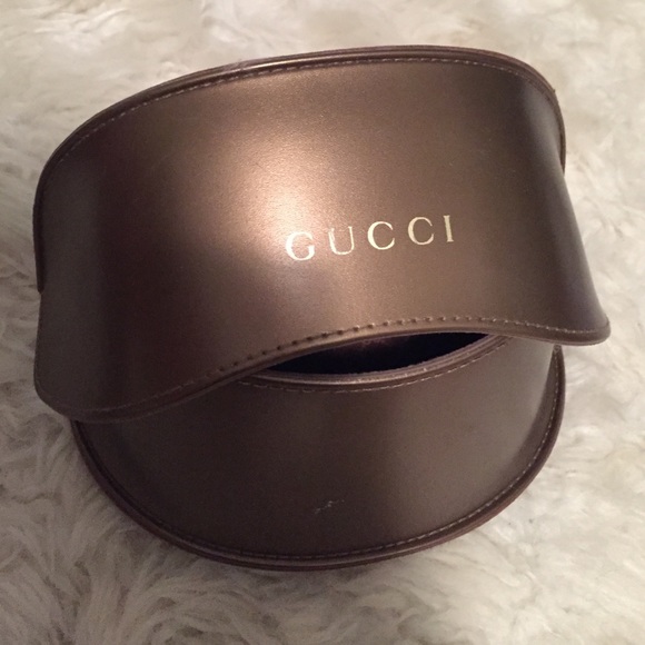 Gucci sunglasses case. Shiny brown