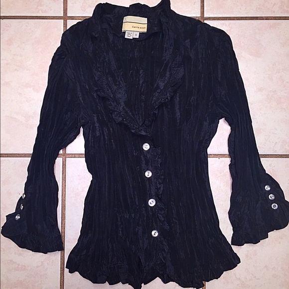 A black dressy shirt with diamond buttons