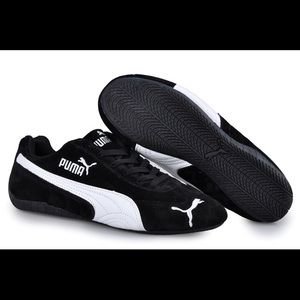 Black and White Puma Sneakers. Barely worn