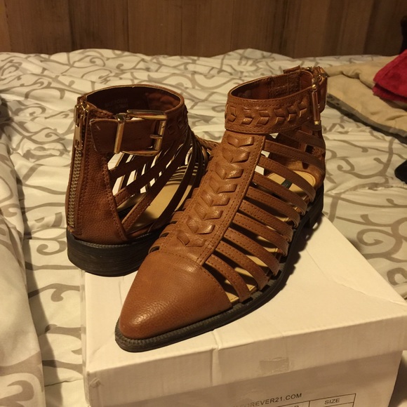 Brown pointed cutout booties